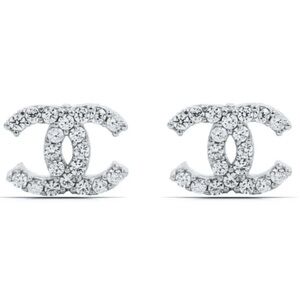 Absolutely stunning CC silver brand new  studs earrings with sparkly crystals .